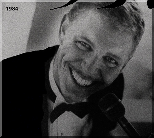 Close up of Jerry Michelsen in a tuxedo, at the grand piano. The photo is from nineteen eighty-four.