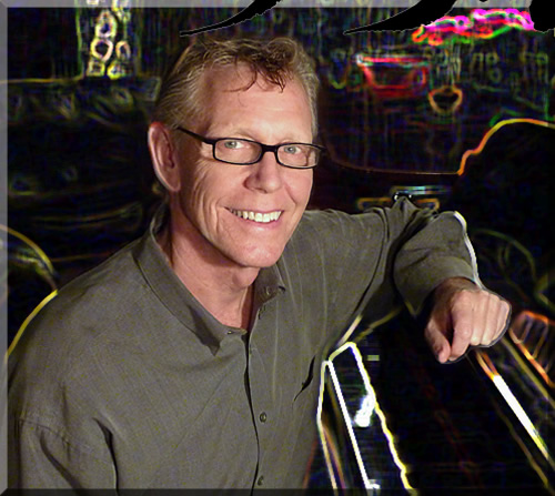 Stylized photo with neon lights of Jerry Michelsen at a grand piano, smiling